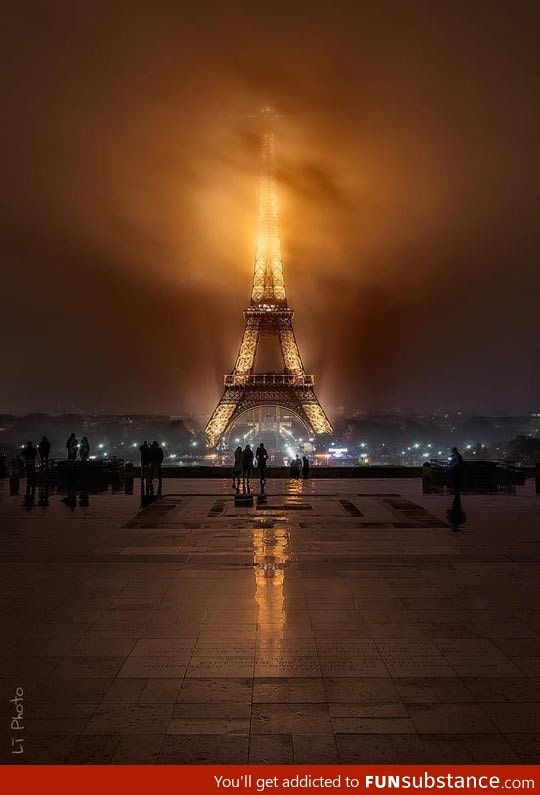 Eiffel Tower on a foggy night