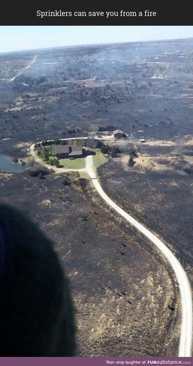 Homeowner turned his sprinklers on before leaving to escape a Kansas wildfire
