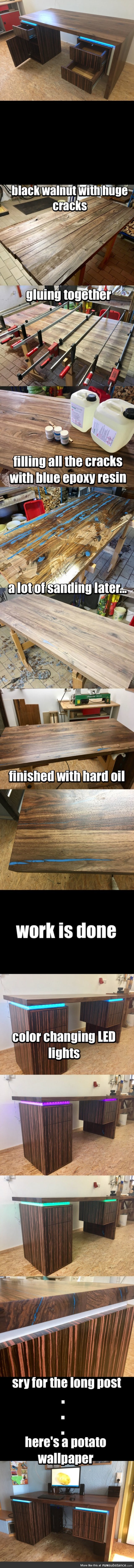 A desk made out of black walnut with blue epoxy inlay