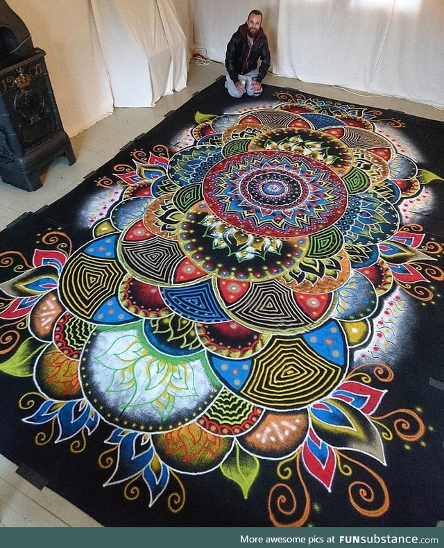 Huge mandala made completely out of coloured sand