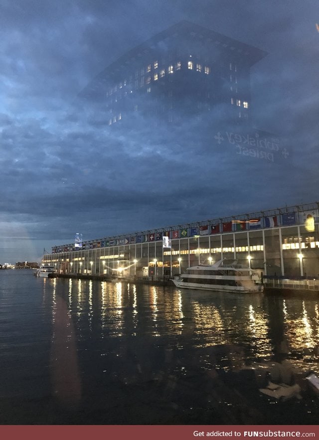 The reflection of this building makes it look as if it's in the sky