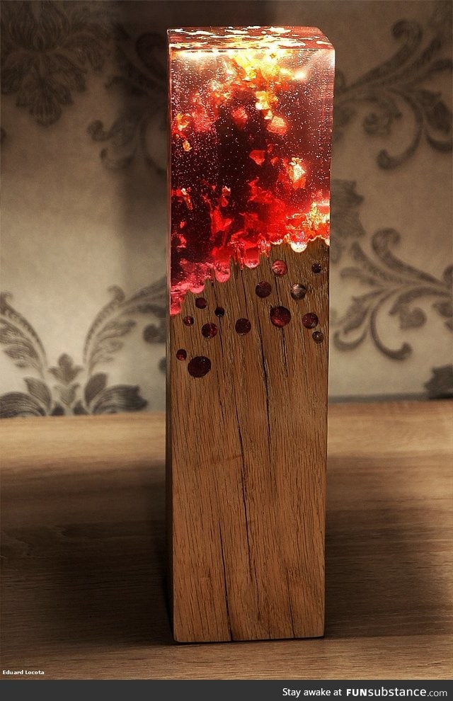 Wood lamp made with acrylic glass looks like it's burning