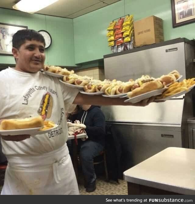 This guy is better at serving hot dogs than I will be at doing anything ever in my life