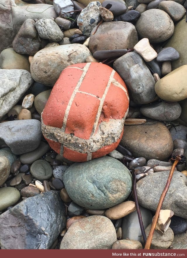 The ocean molded this clump of bricks into a rock shape