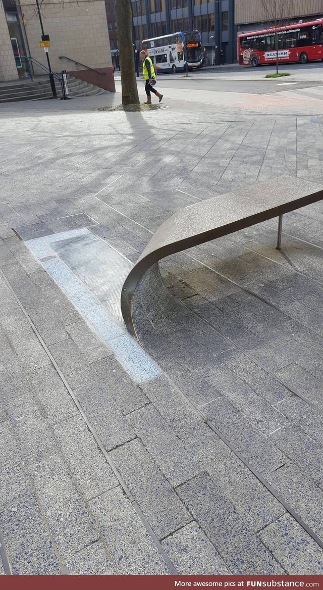 This bench is made from a curled-up paving stone