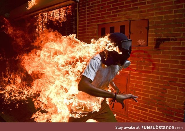 World Press Photo of the Year: José Víctor Salazar Balza caught fire during a protest