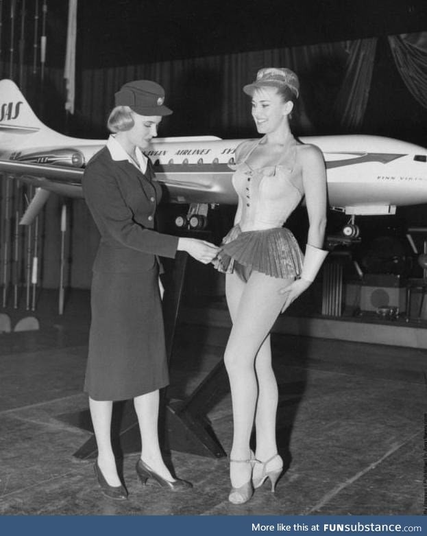Scandinavian Stewardess examines a new uniform proposal for Scandinavian Airlines in 1964