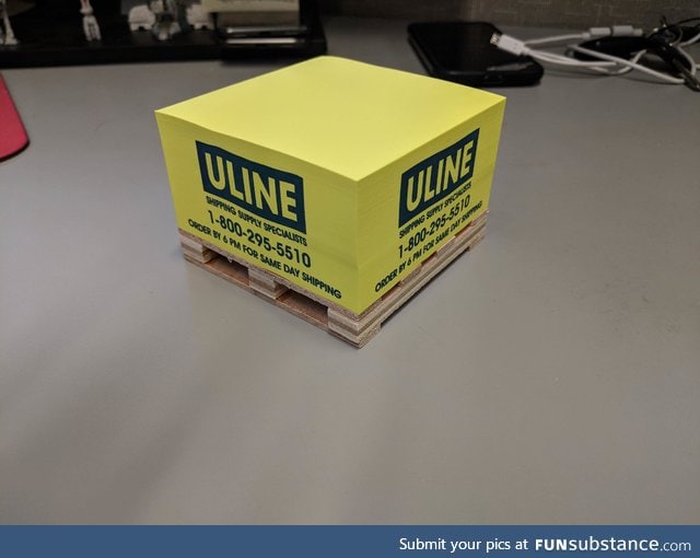 This shipping company advertise their sticky notes with a tiny pallet