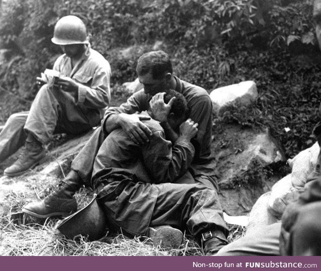 American Soldier Comforting Fellow Soldier Who’s Friend Was KIA - Korean War