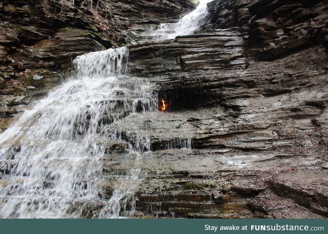Eternal Flame Falls. A naturally occurring flame burns inside the heart of this waterfall