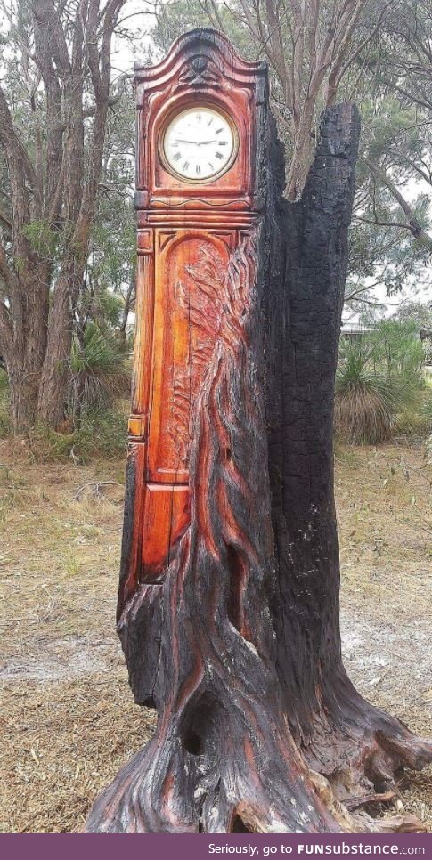 A Grandfather clock made from a burnt tree