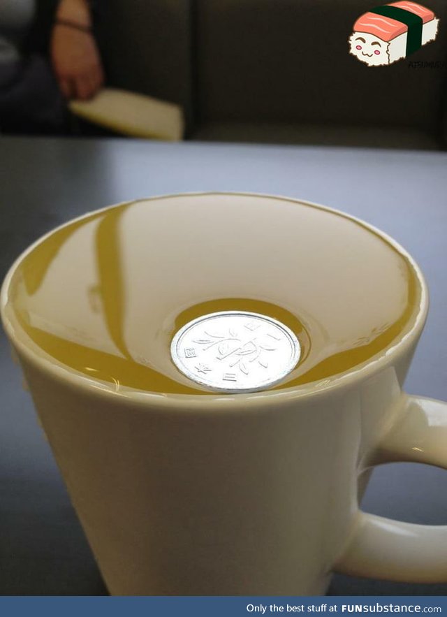 A Japanese 1 yen coin is so light it won't even break surface tension