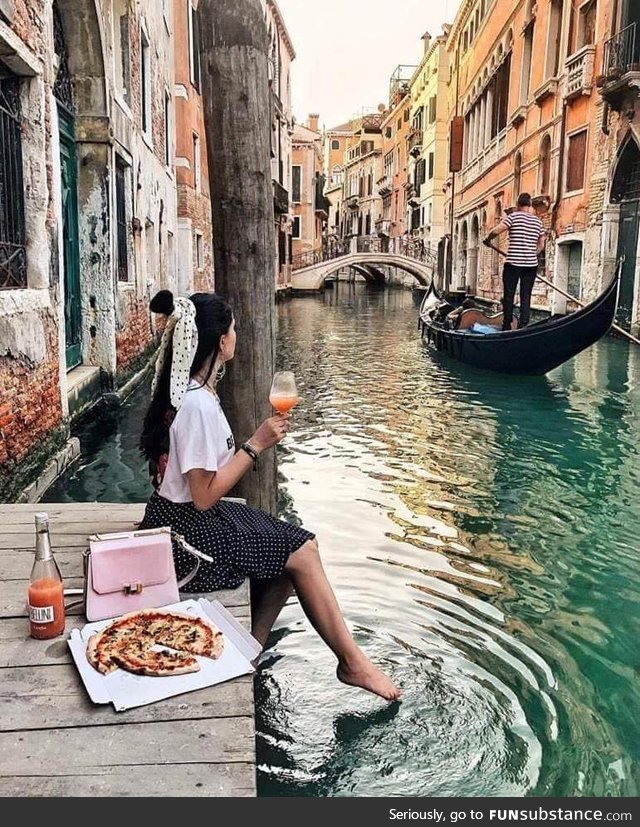 Pizza delivery in Venice, Italy