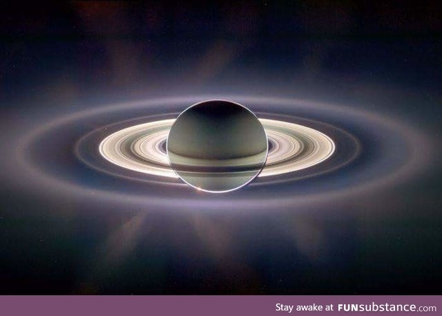 Saturn eclipsing the sun. Image: Cassini