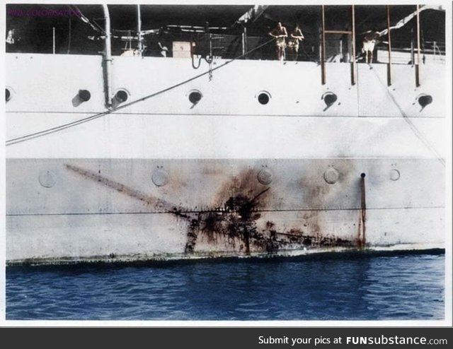 The imprint of a kamikaze Mitsubishi Ki-51 on the side of H.M.S Sussex in 1945