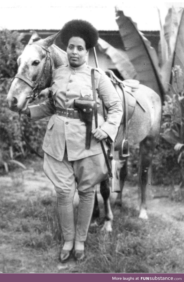 Ethiopian female soldier preparing to fight against Benito Mussolini's fascist Italy