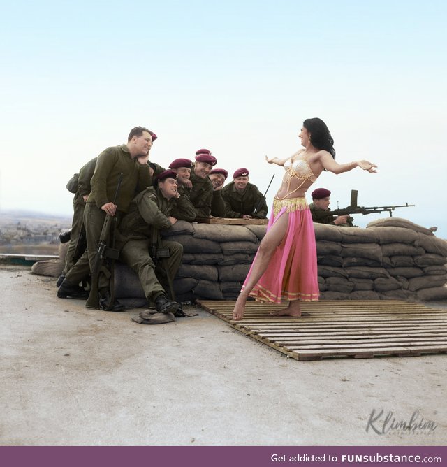 A belly dancer entertains British troops in Cyprus, 1964