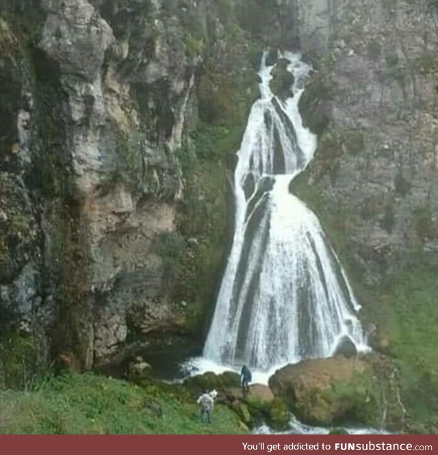 This waterfall looks like a woman in a dress