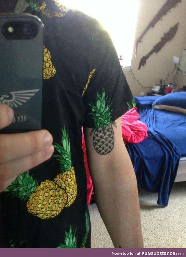 The way the tattoo lines up with the shirt