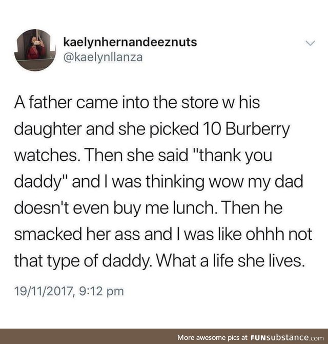 A father and daughter walk into a store
