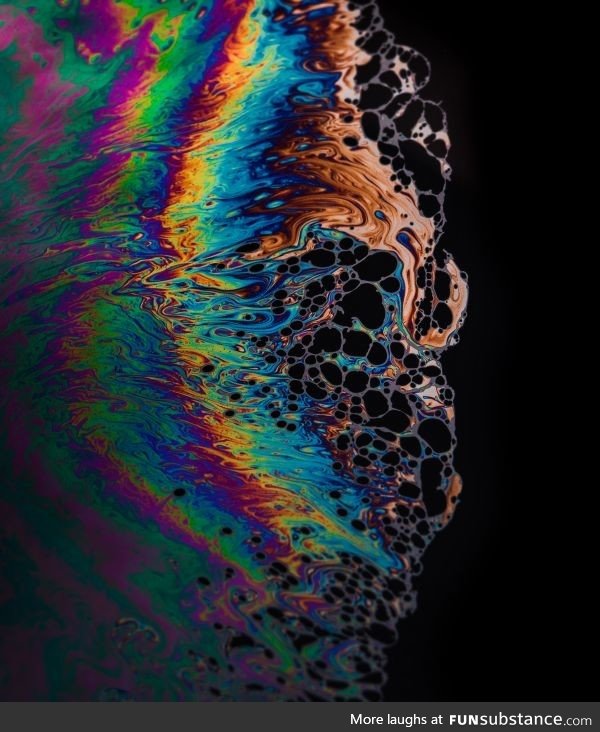 I took this close up photo of a soap bubble's surface breaking down