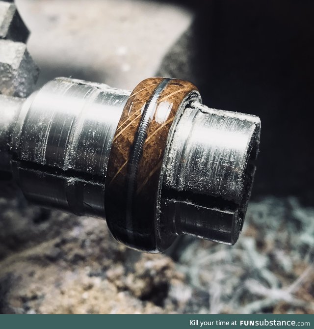 This ring is being made from a Jack Daniels Whiskey barrel and a worn guitar string inlay