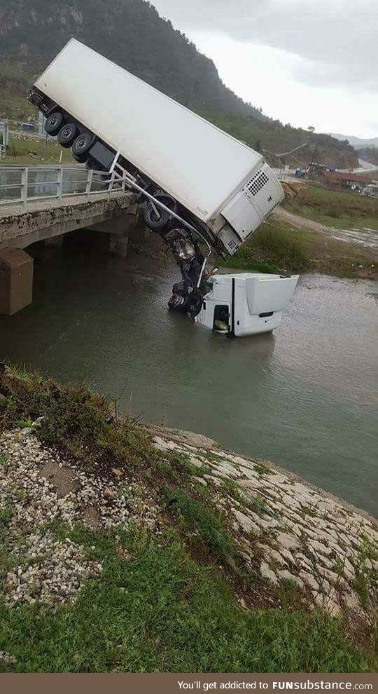 Here we see a rare photo of a truck in its natural habitat, drinking water from a river