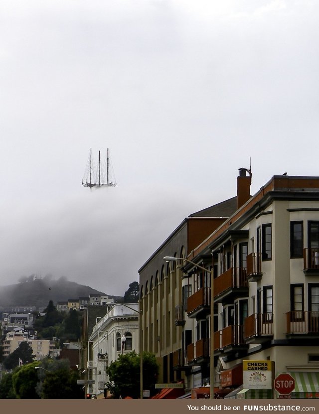 This picture in San Francisco looks like a ship floating on the clouds