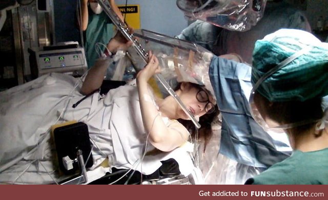 A Russian flutist playing Mozart songs during the removal of her brain tumor
