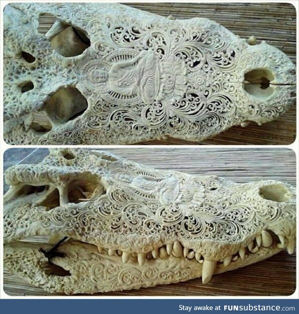 Beautiful Buddhist carving's on an alligator skull