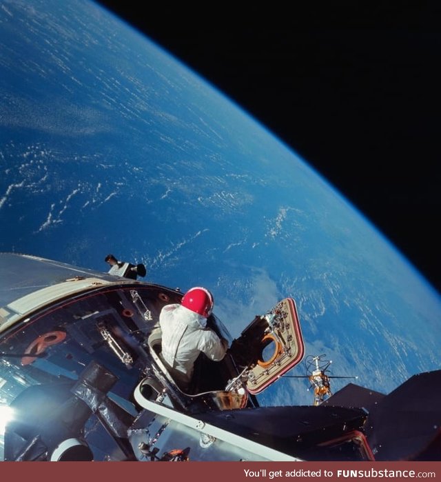 Astronaut Dave Scott looks at Earth from the Apollo 9 Command Module in March, 1969. NASA