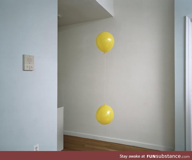 Helium filled balloon and non helium filled balloon appears to be stuck in the same spot