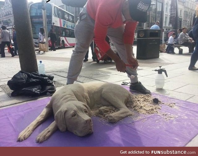 This dog made out of sand