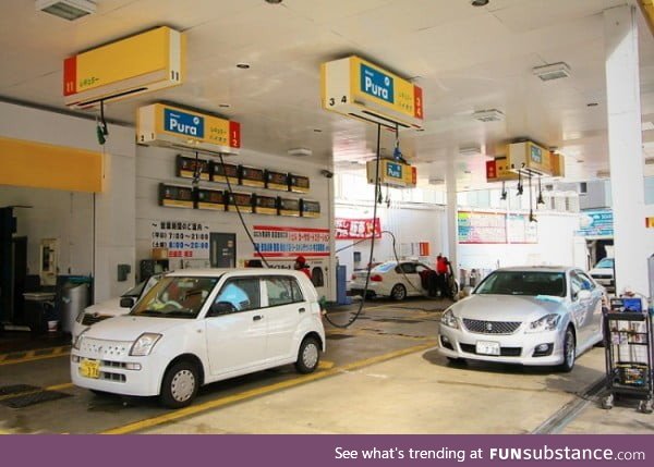 Japan places the fuel pumps in the ceiling so you can use them from anyside.. Basically
