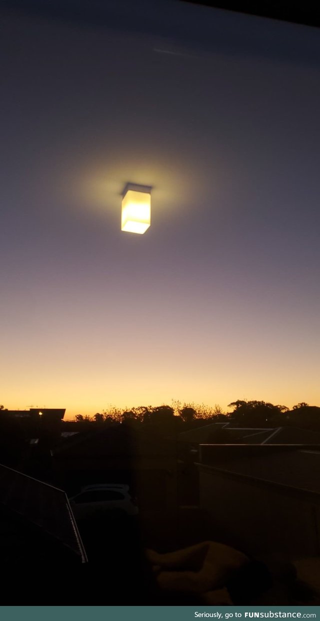 The view from my friend's room makes it look like his light is in the middle of the sky