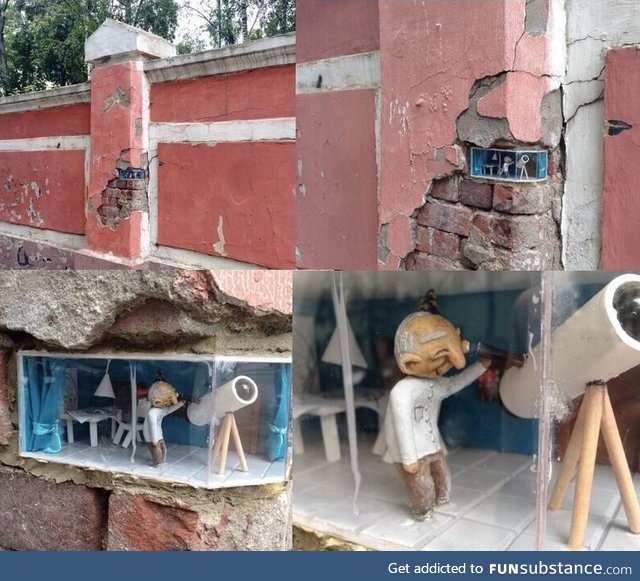 An inventive bit of street art used to replace a brick missing from a wall