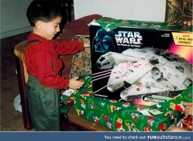 Opening my first Star Wars toy on Christmas 1995 (I still have it by the way)