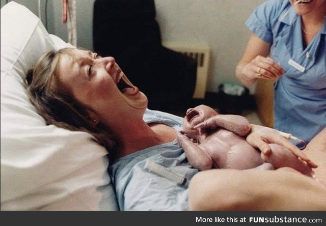 Moments after giving birth a mother laughs hysterically at her husband who just fainted