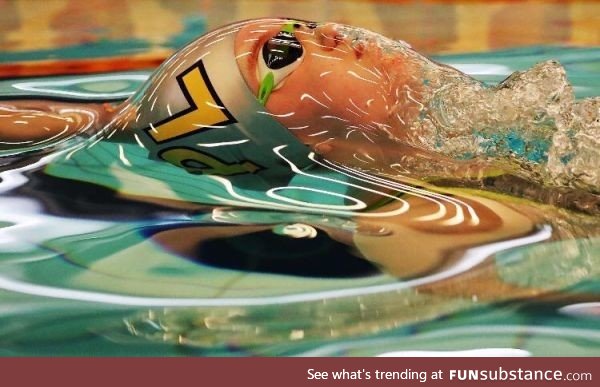 A swimmer in a water bubble
