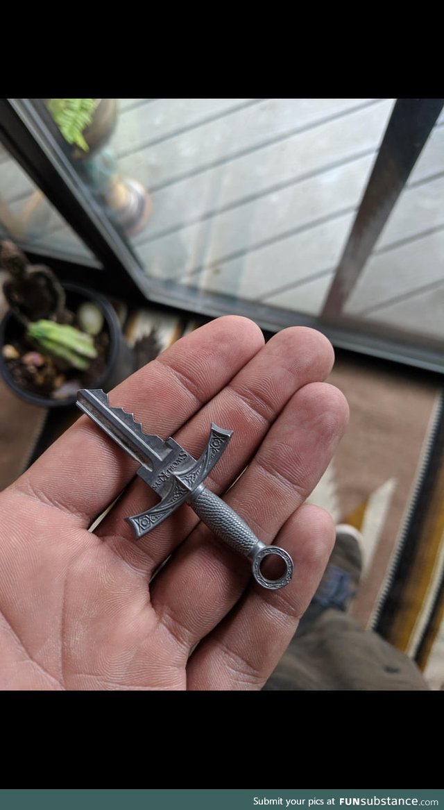 Key shaped like a sword