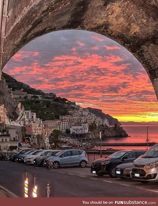 Under the bridge in the sunset, Amalfi, Italy