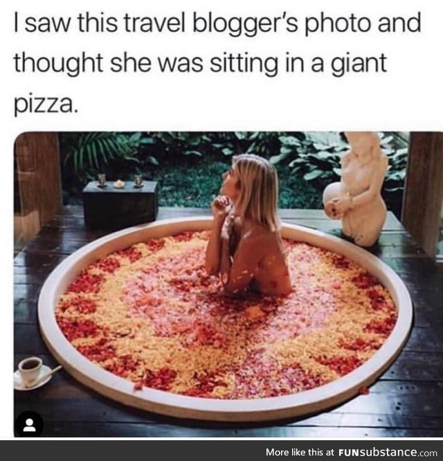 Blogger taking a pizza bath