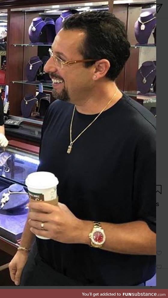 Adam Sandler looks like he owns every gas station in Detroit