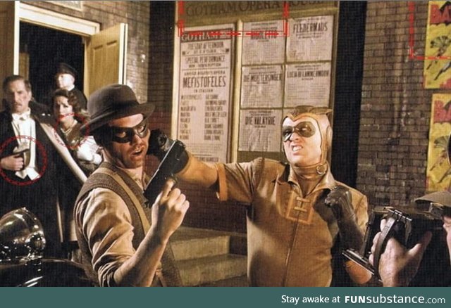 During the 'Watchmen' (2009) opening credits, the original Nite Owl rescues