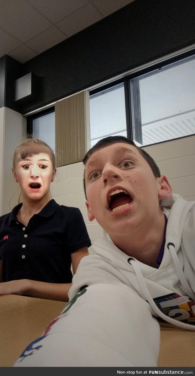 My friend and I did face swap at school. I’m the one in the back.