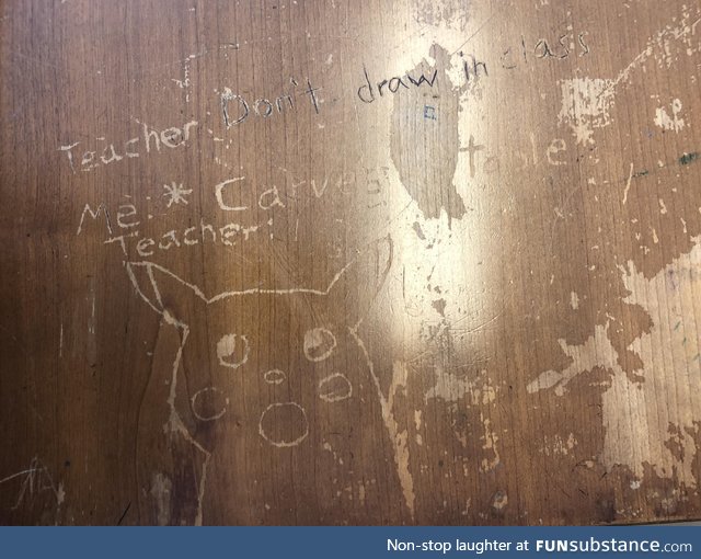 Found carved into a desk where I taught some classes this summer