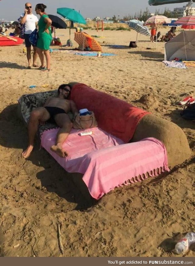 Genius on the beach. Why build sand castle when you can build sand sofas