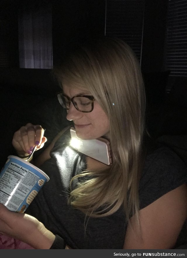 I look over and my wife is using her phone light to eat ice cream while we Netflix in the