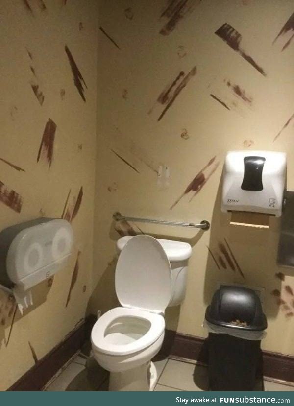 A poor choice of wallpaper for a bathroom