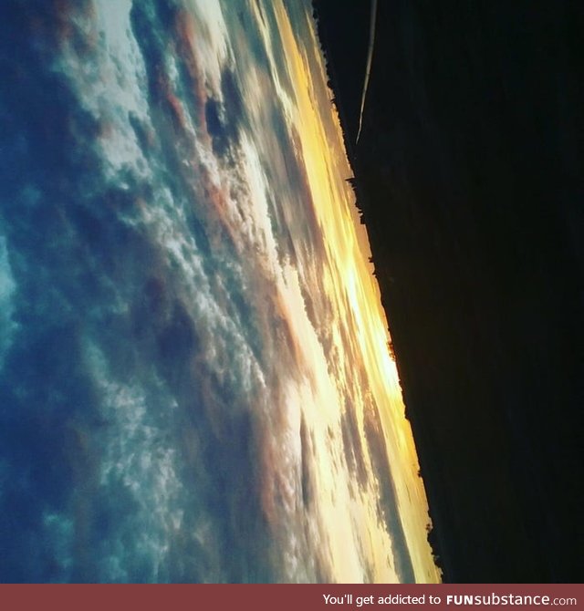 The way this sideways picture of a sunset looks like a satellite image of earth